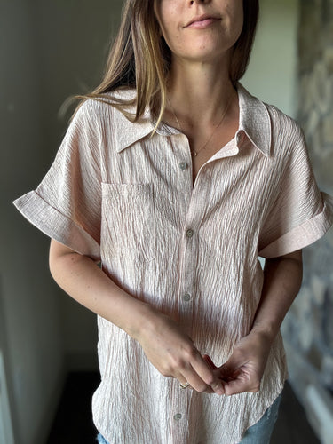 blush short sleeve button down top