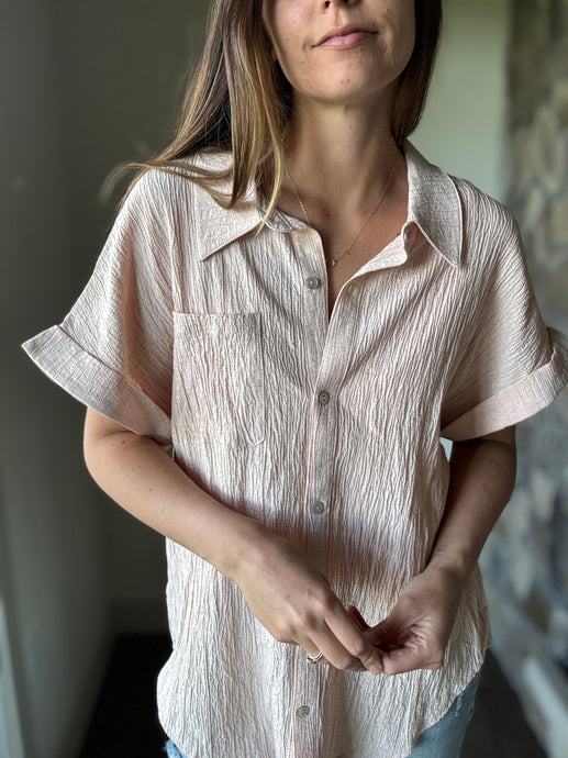 blush short sleeve button down top