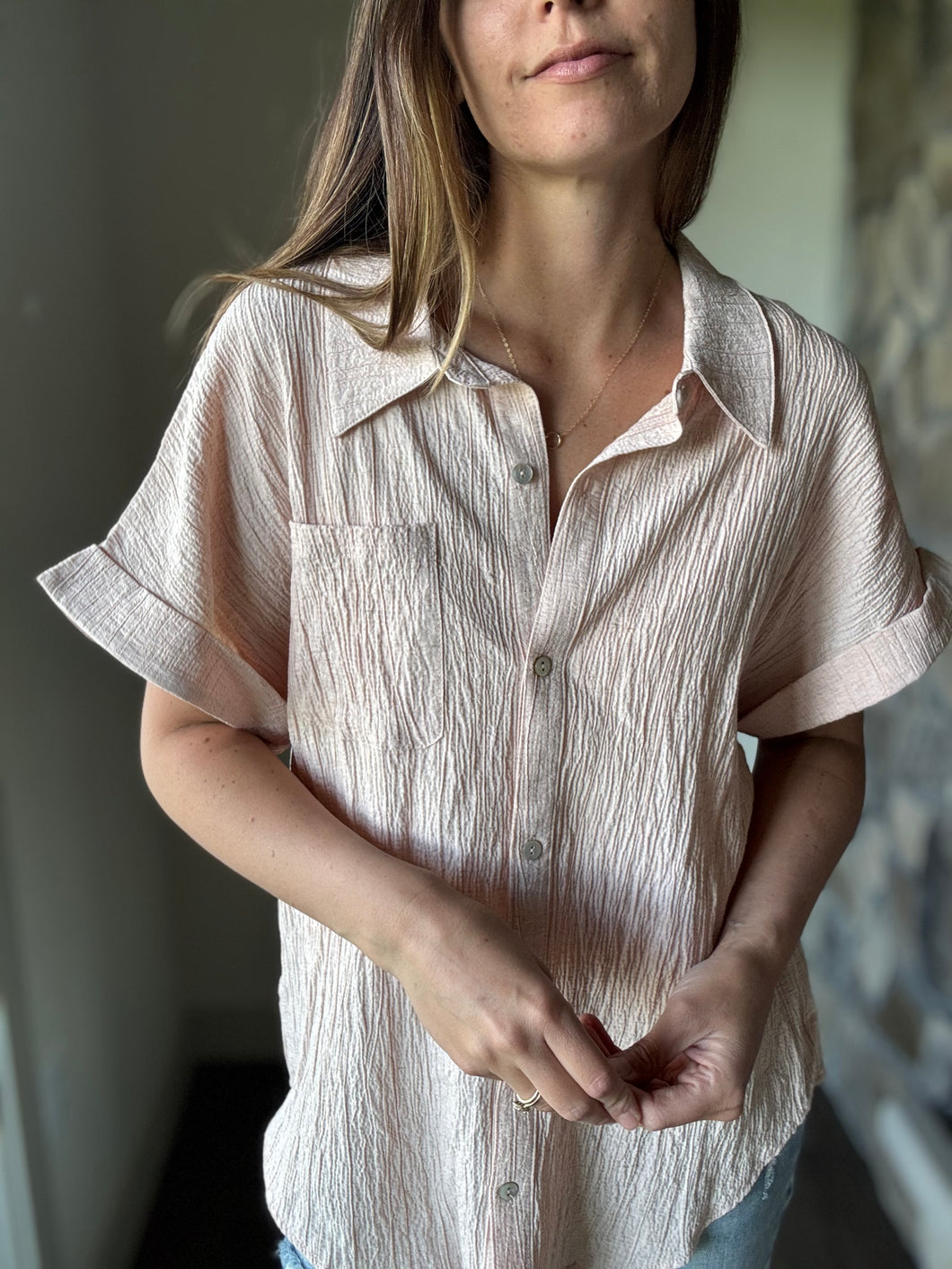 blush short sleeve button down top