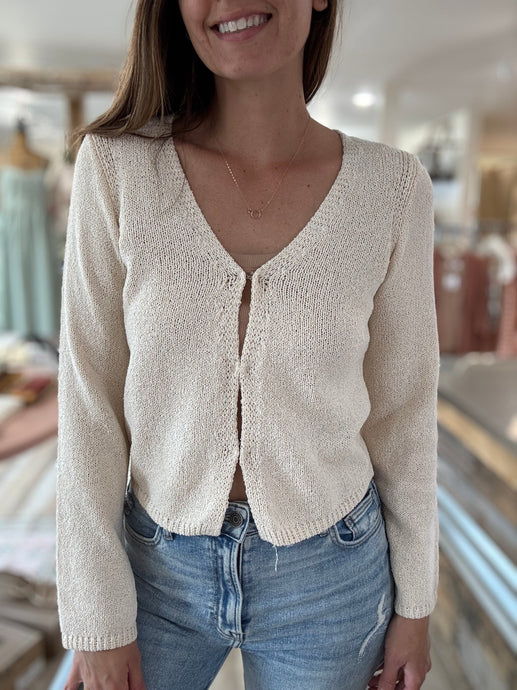 ivory knit cardigan with hook + eye front