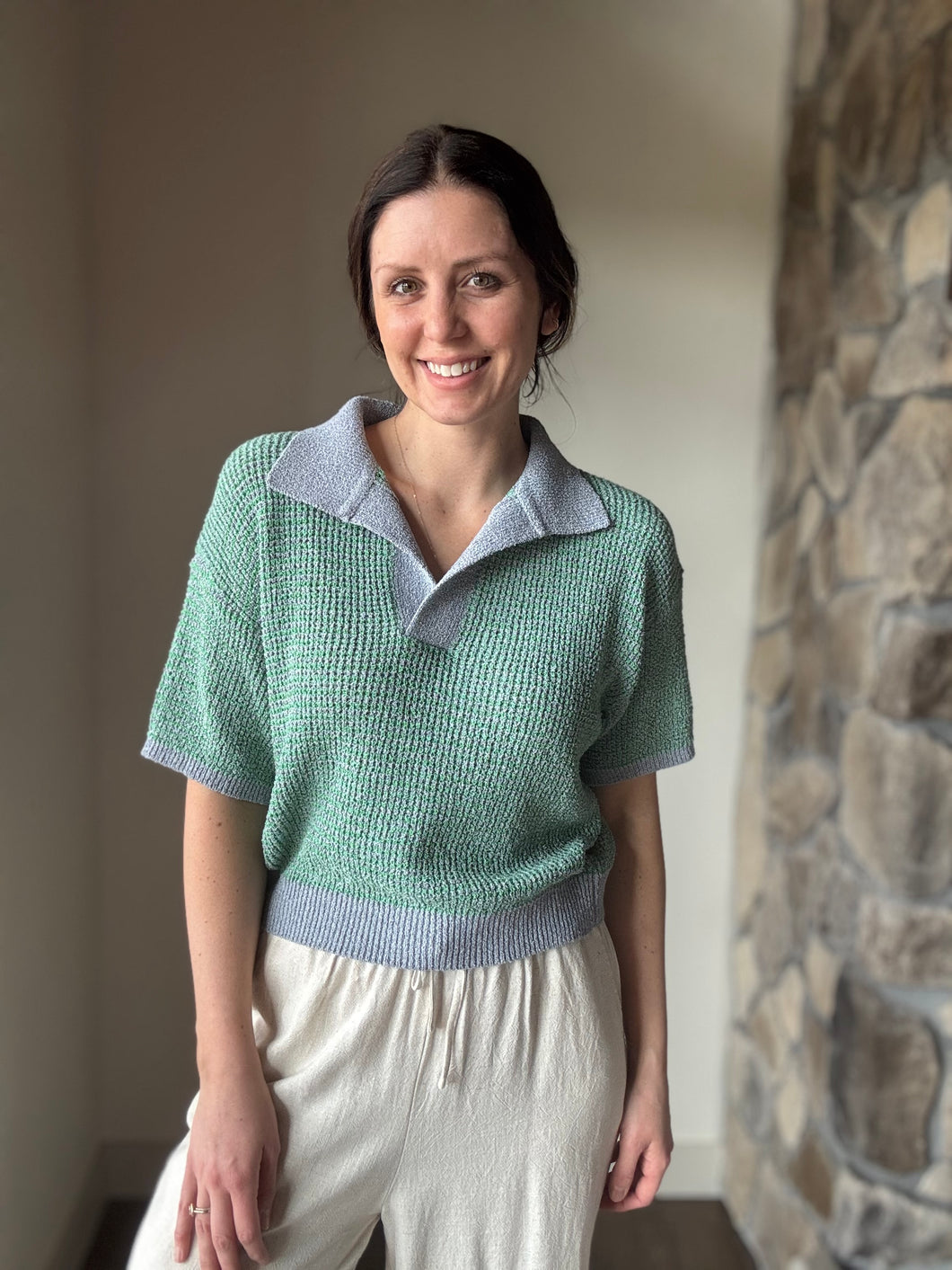 green + blue knit short sleeve collared top