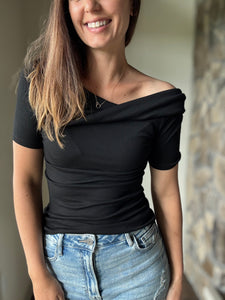 black asymmetrical twist ribbed top