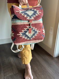 rust, brown, turquoise + tan aztec woven backpack