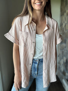 blush short sleeve button down top
