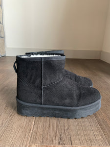 black fur-lined ultra mini platform boots