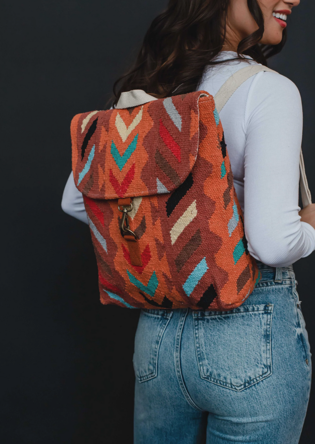 orange multi woven backpack