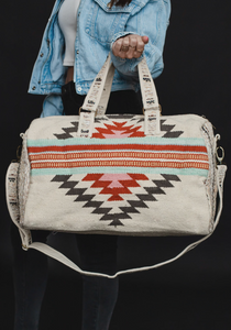 beige, brown, light blue + red aztec woven weekender bag