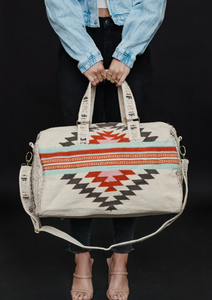 beige, brown, light blue + red aztec woven weekender bag