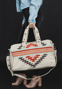 beige, brown, light blue + red aztec woven weekender bag