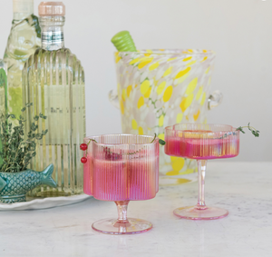 iridescent pink hand-blown pleated flower shaped coupe glass