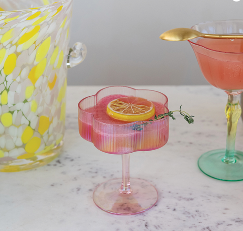 iridescent pink hand-blown pleated flower shaped coupe glass