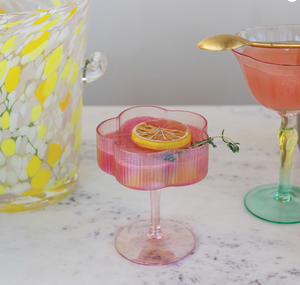 iridescent pink hand-blown pleated flower shaped coupe glass