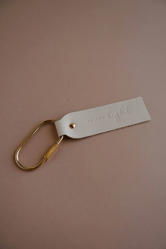 be the light blonde key fob keychain