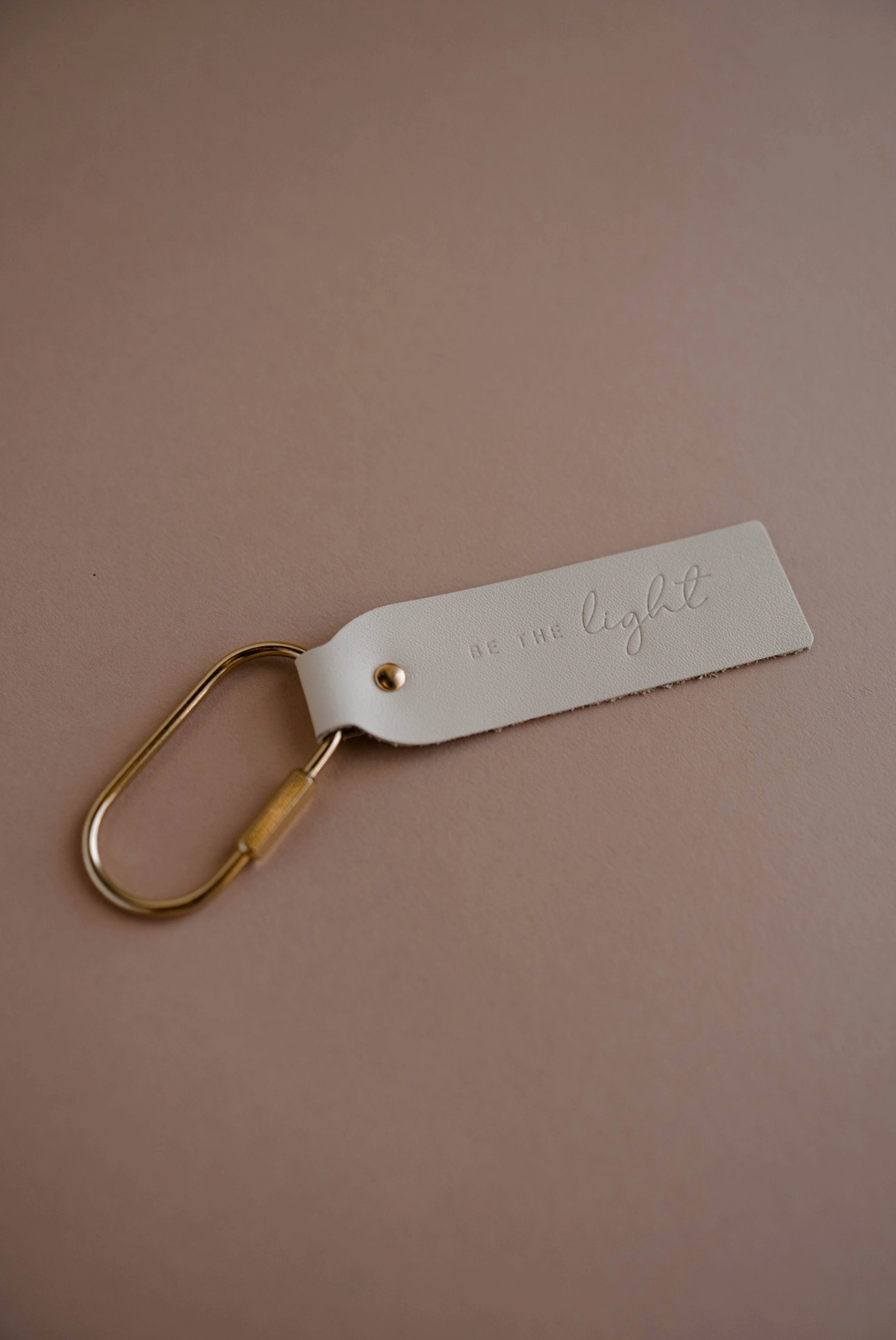 be the light blonde key fob keychain