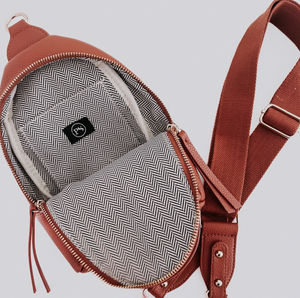 whiskey brown travel sling bag